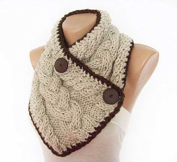 Knitted neck scarf with button pattern
