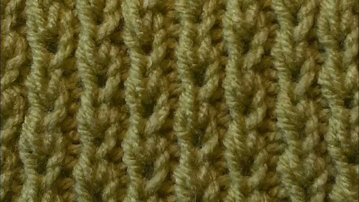 Knitted scarf with buttons pattern