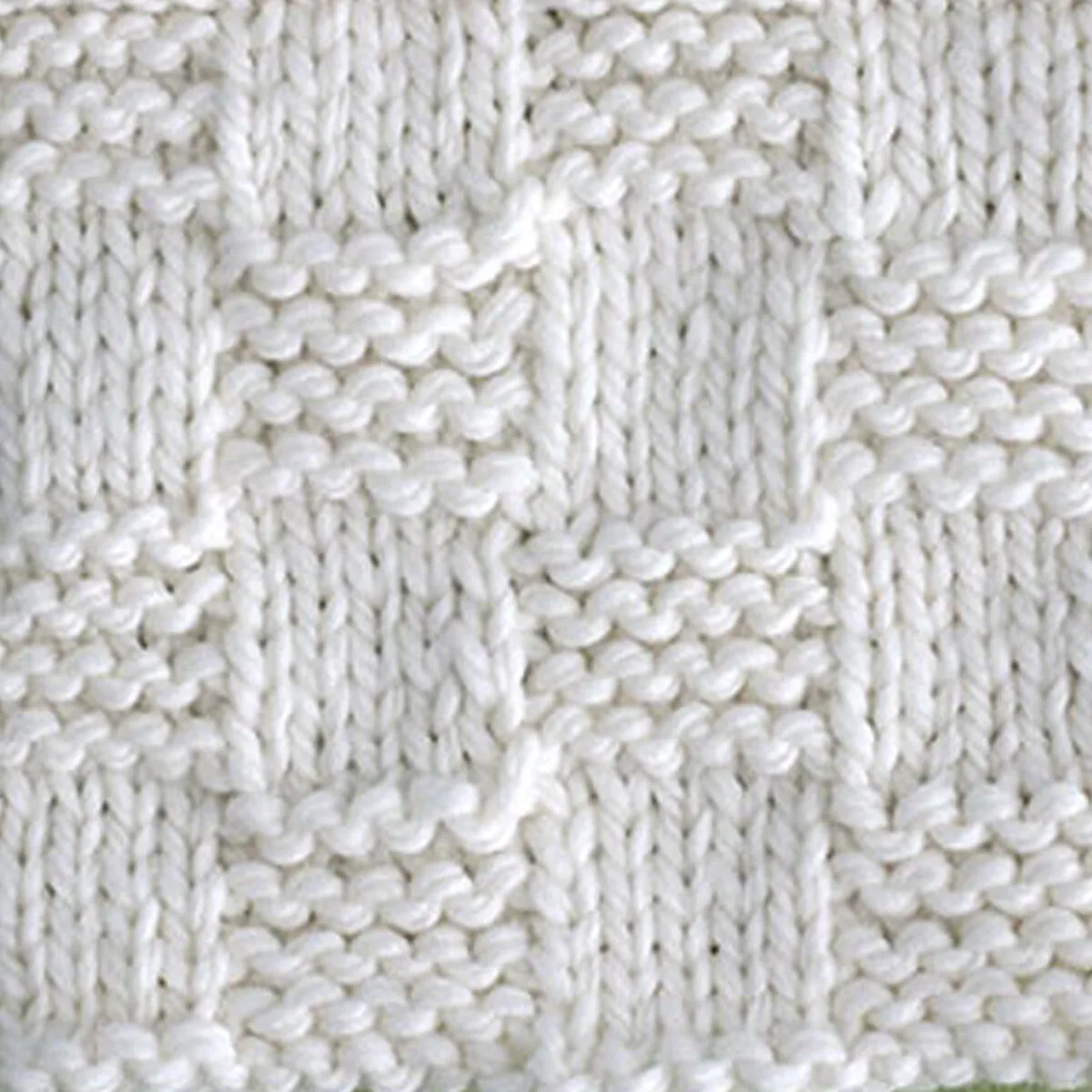 Checkerboard knitted blanket pattern