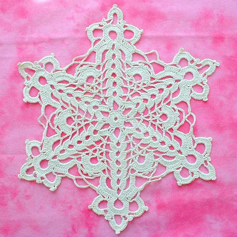 Creating Delicate Snowflake Lace with Knitting Needles Snowflake lace knitting pattern