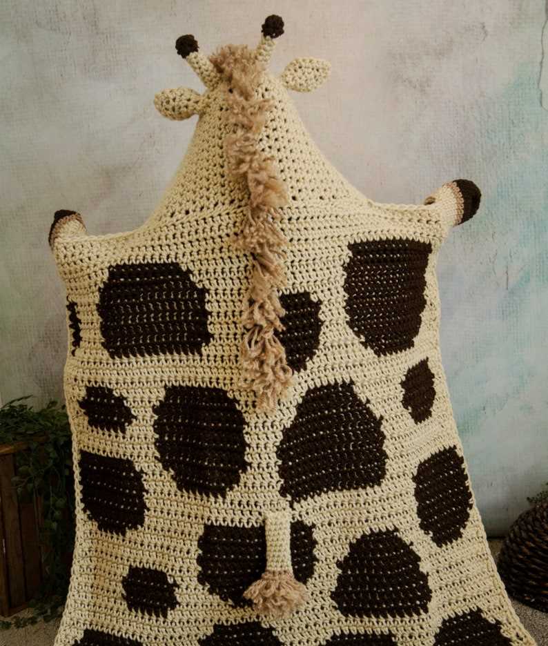 Create your own adorable giraffe blanket with this knitting pattern Giraffe blanket knitting pattern