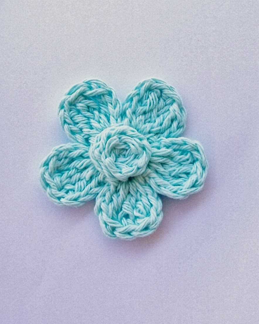 Free knitted flower headband pattern