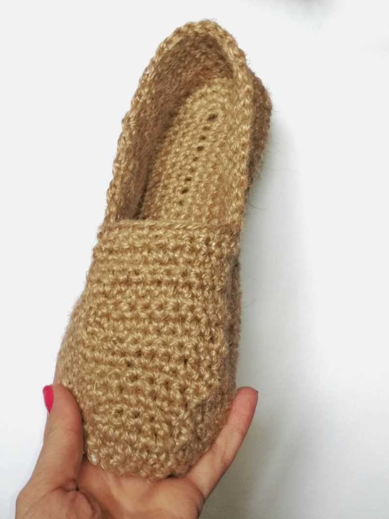 Knitted slippers with soles pattern