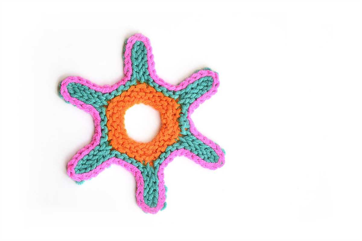 Small knitted star pattern