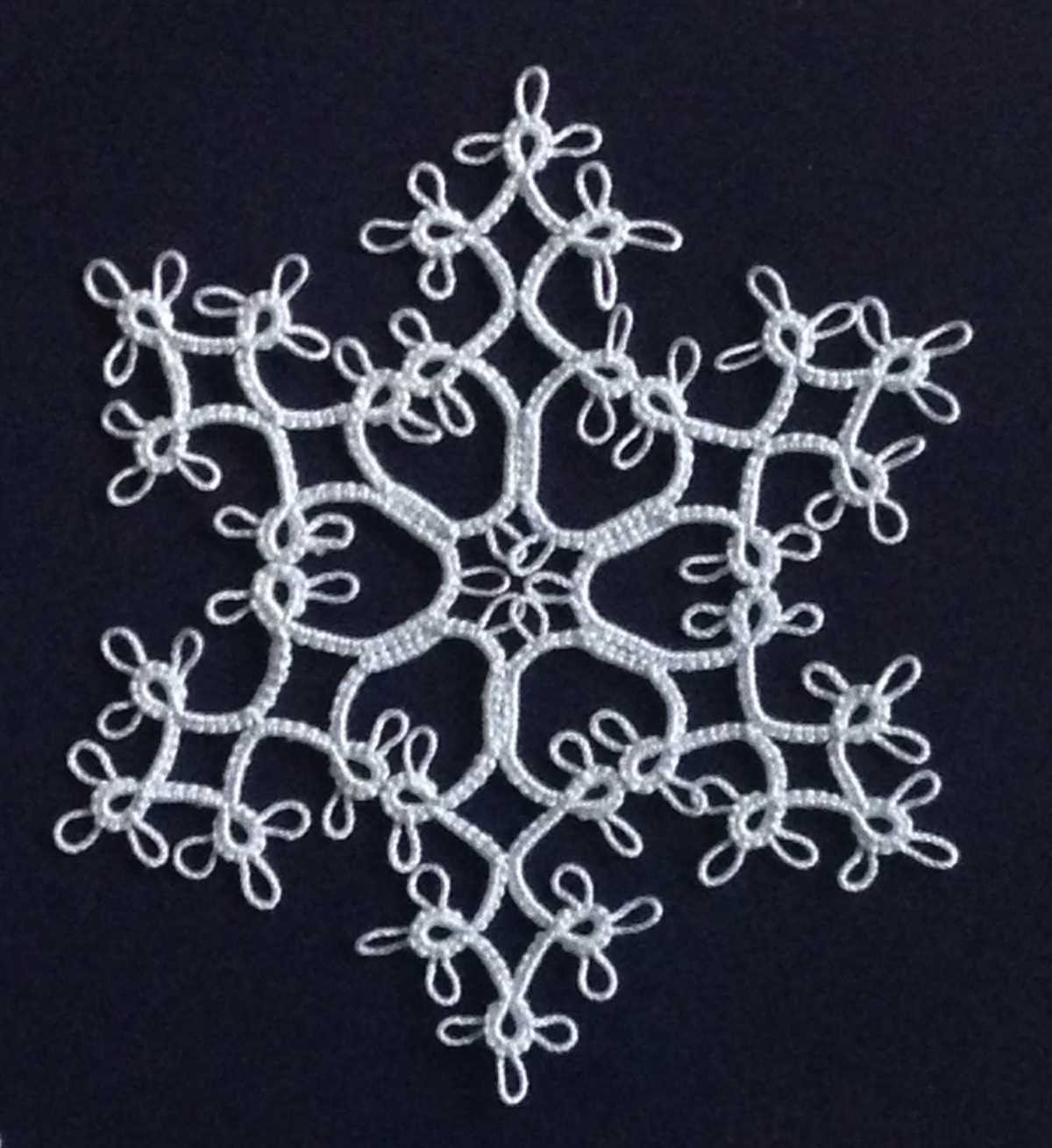 Snowflake lace knitting pattern